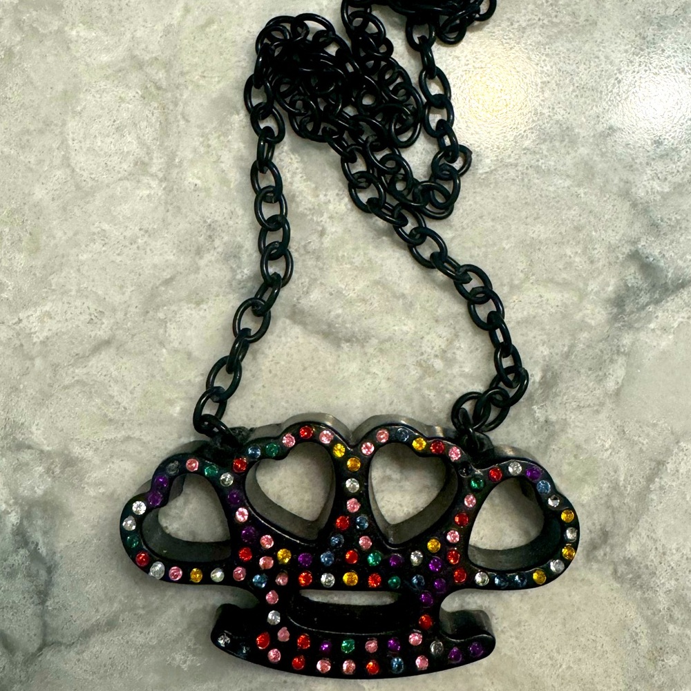 Rock rebel brass knuckle necklace